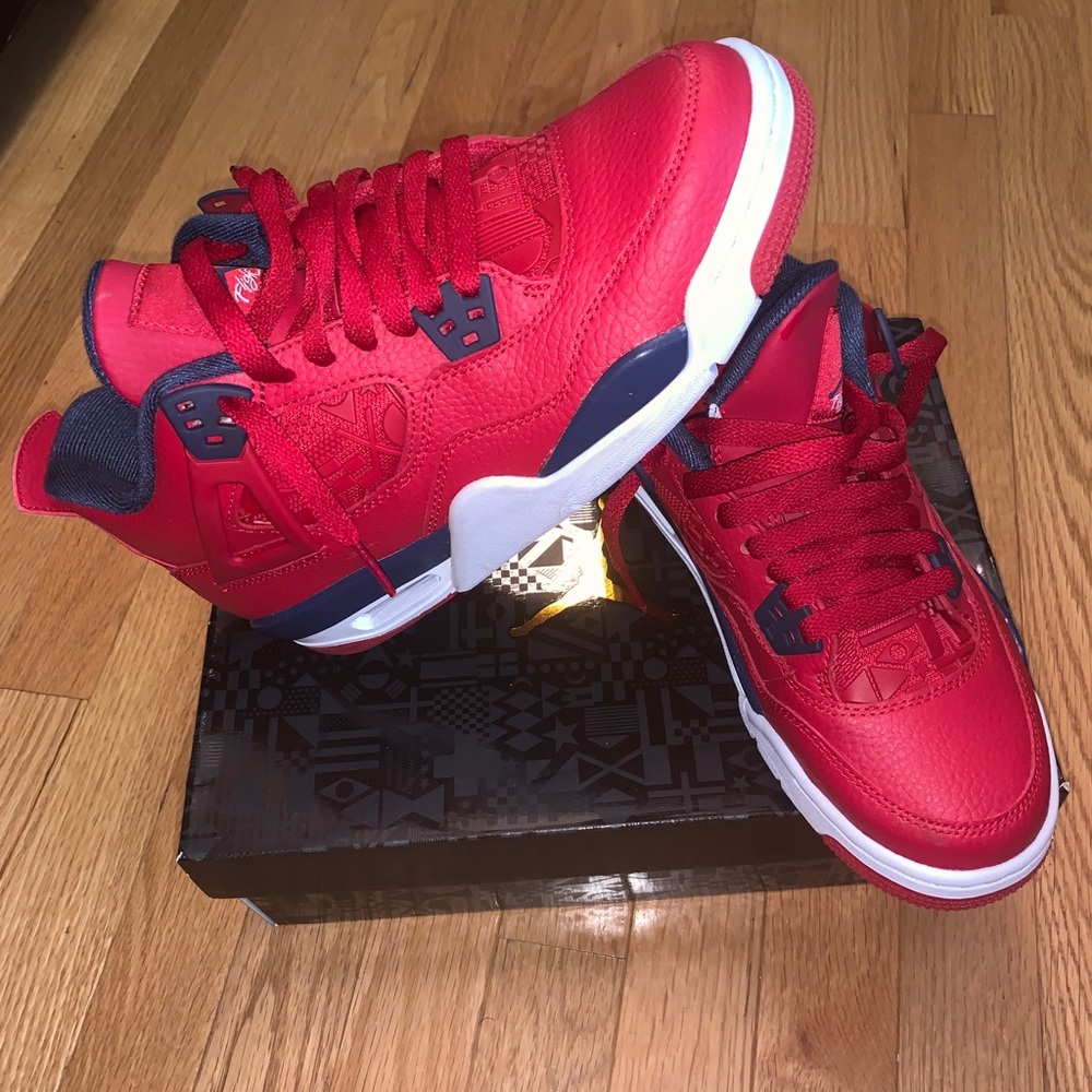 Kid Gently worn Retro Jordan 4 Red and Blue